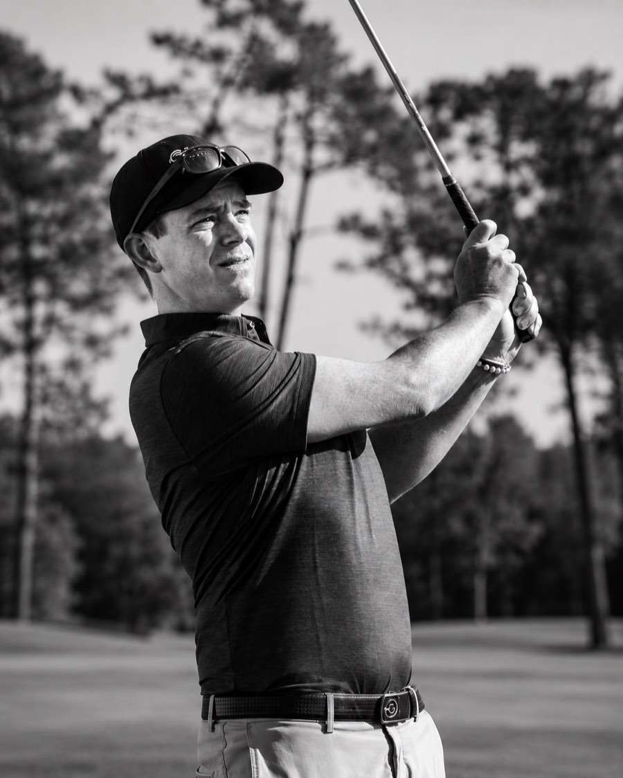 Tennis & Golf Camp 5 PGA Professional Chris Galbraith swinging a golf club